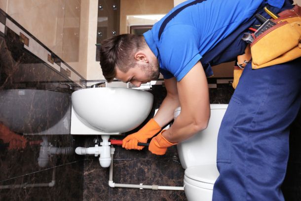 Should I Buy a Drain Snake or Call a Plumber?
